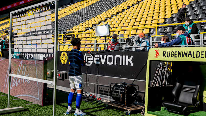 Weston McKennie performs a socially distant TV interview
